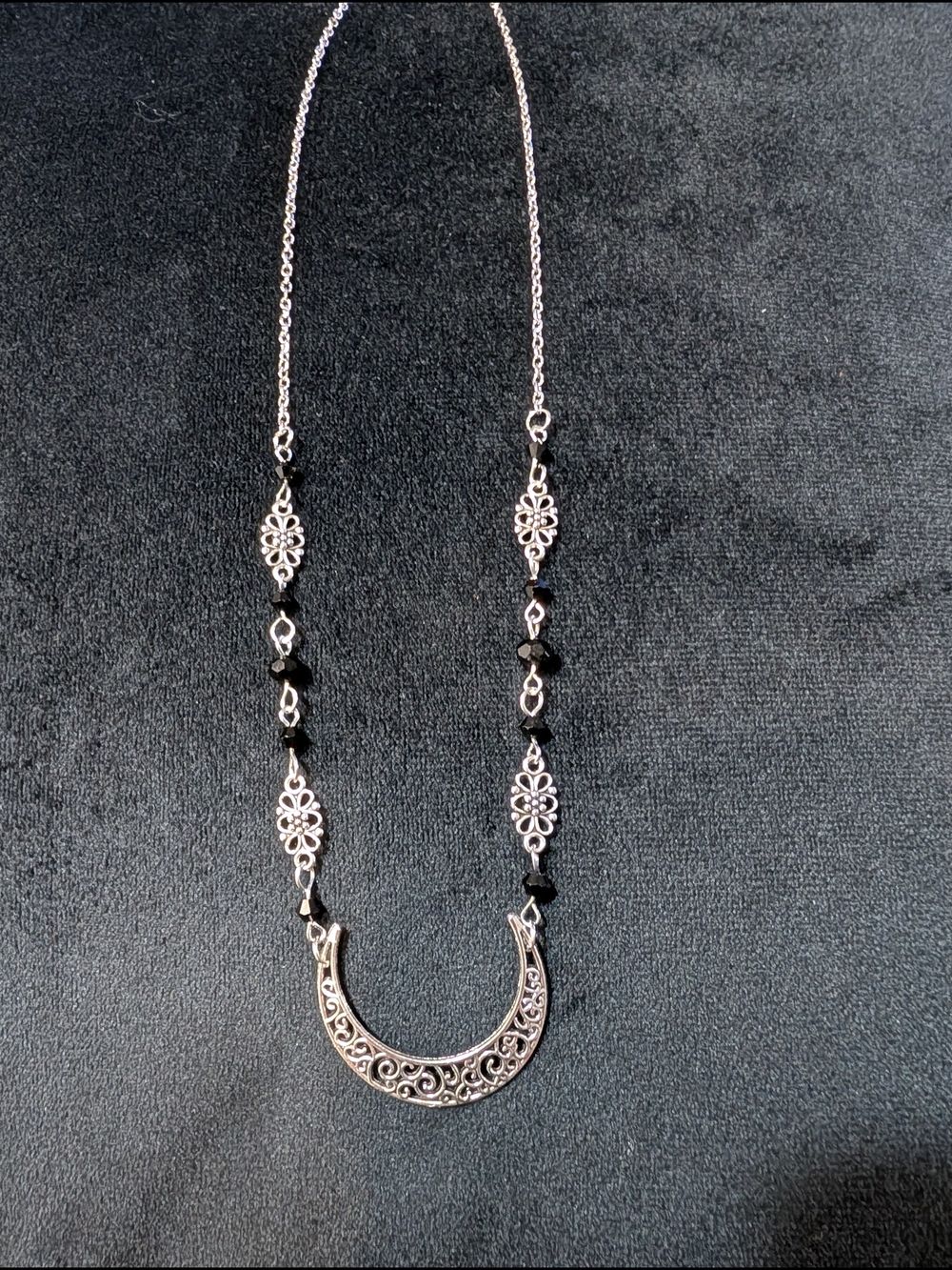 Silver Tone Filigree Crescent Pendant Necklace with Black Accents